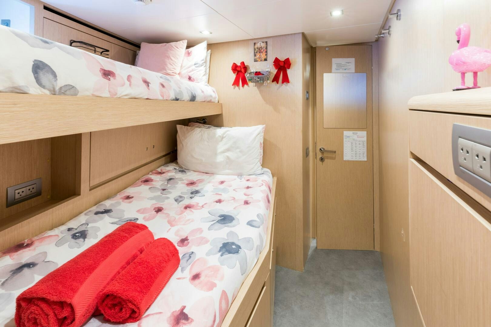 a small bedroom with a bed aboard GLORY Yacht for Sale