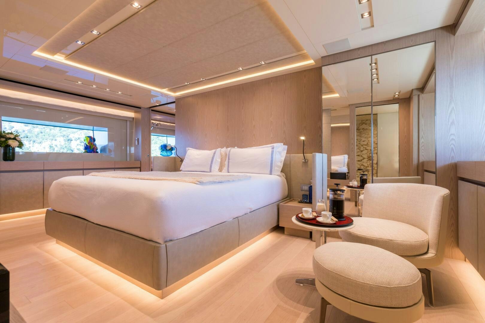 a large bed in a room aboard GLORY Yacht for Sale