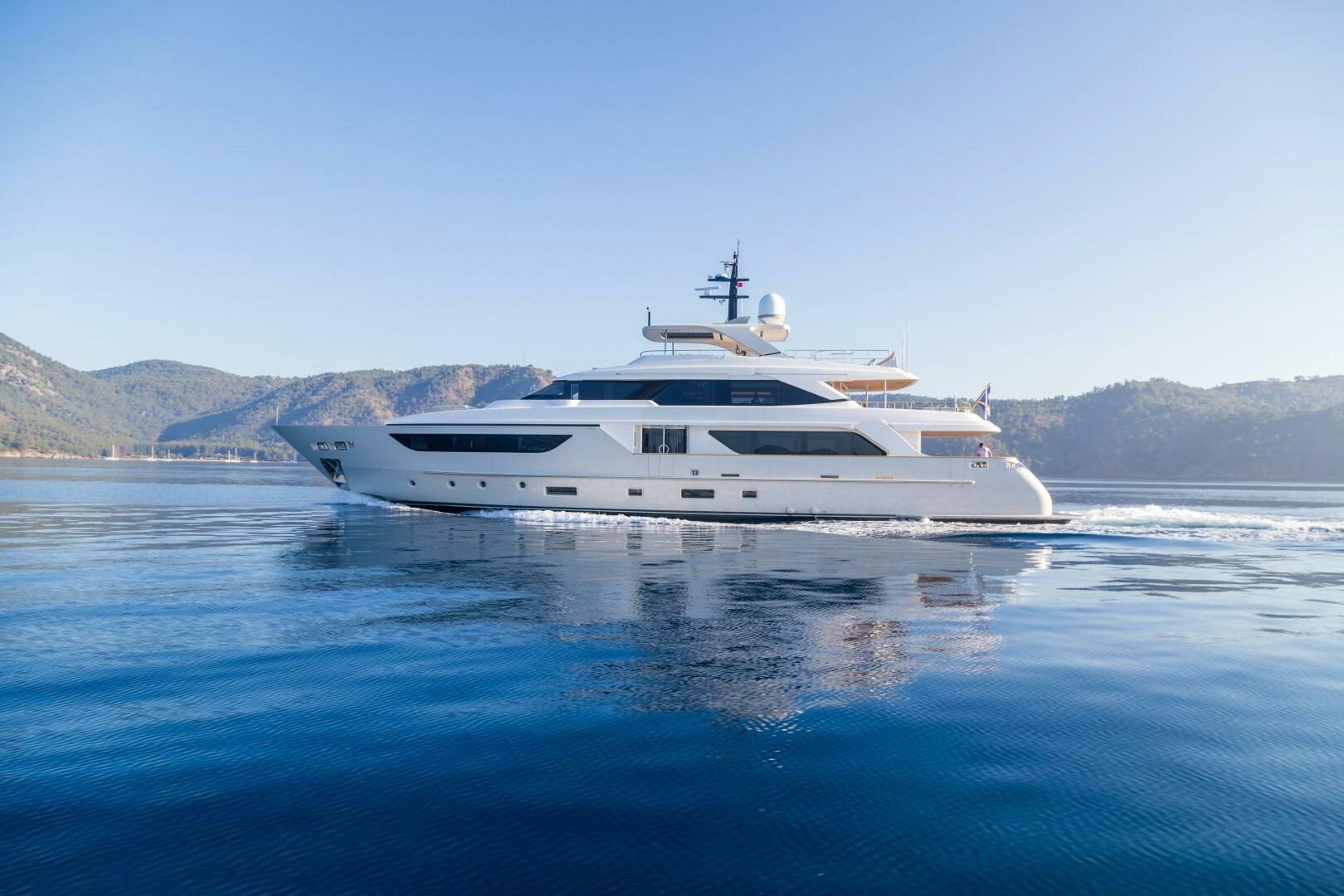 a white yacht in the water aboard GLORY Yacht for Sale