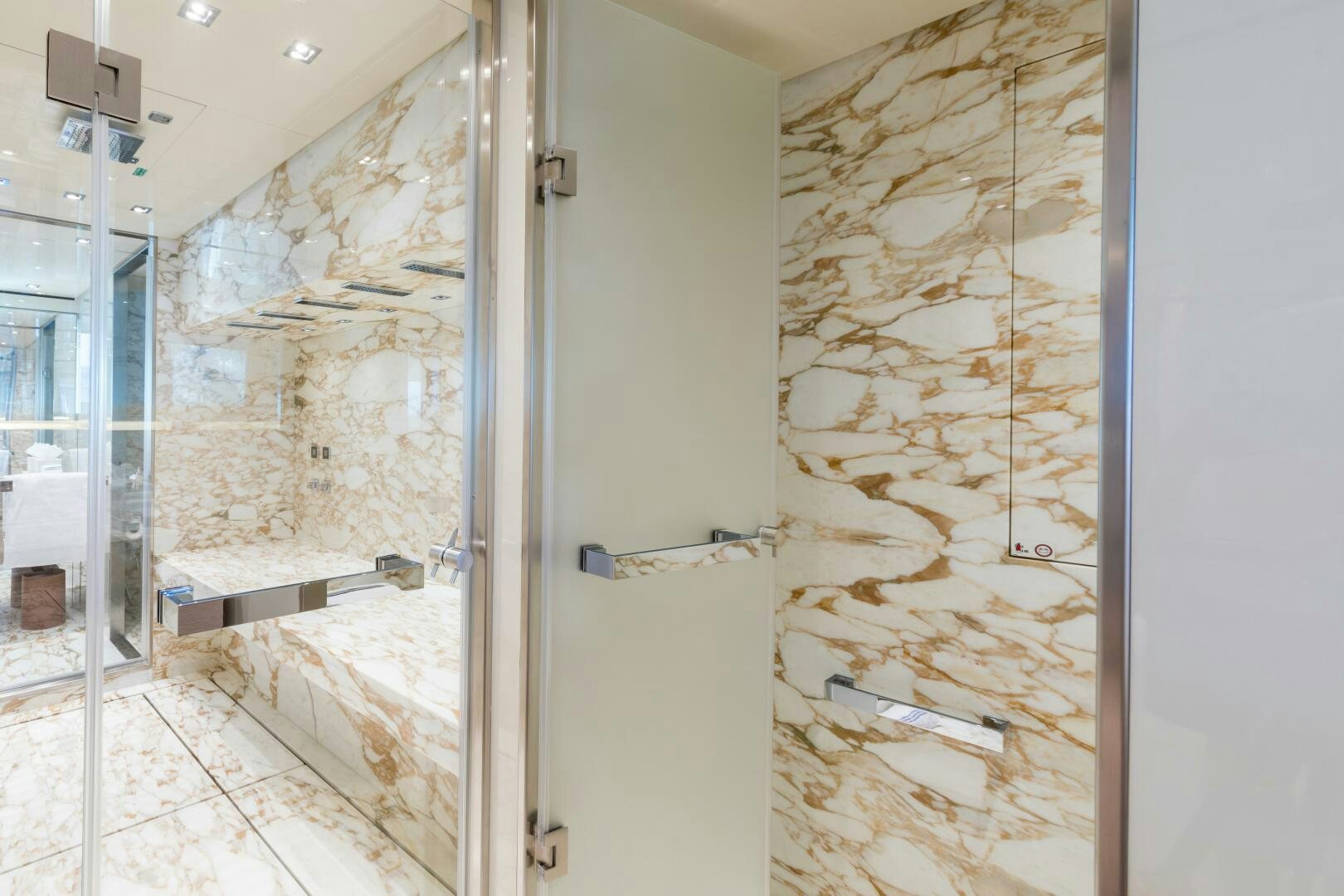 a room with a wall of glass aboard GLORY Yacht for Sale