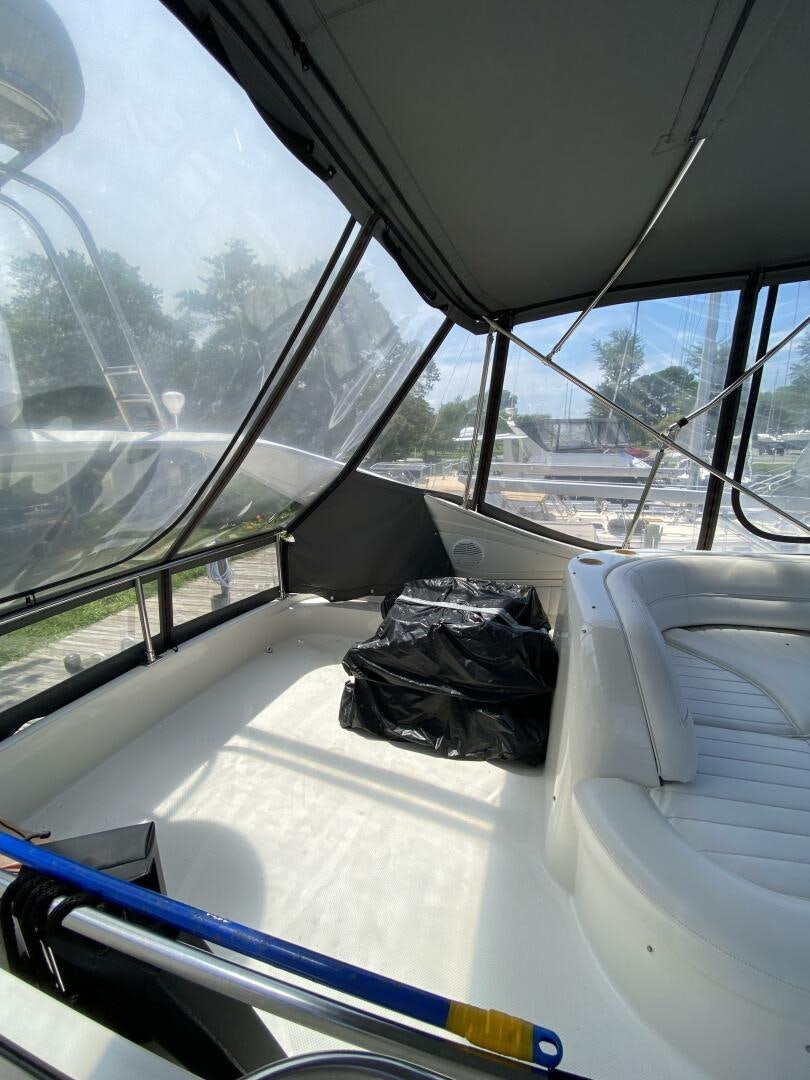 a black bag on a white car aboard BIGG FIGG II Yacht for Sale