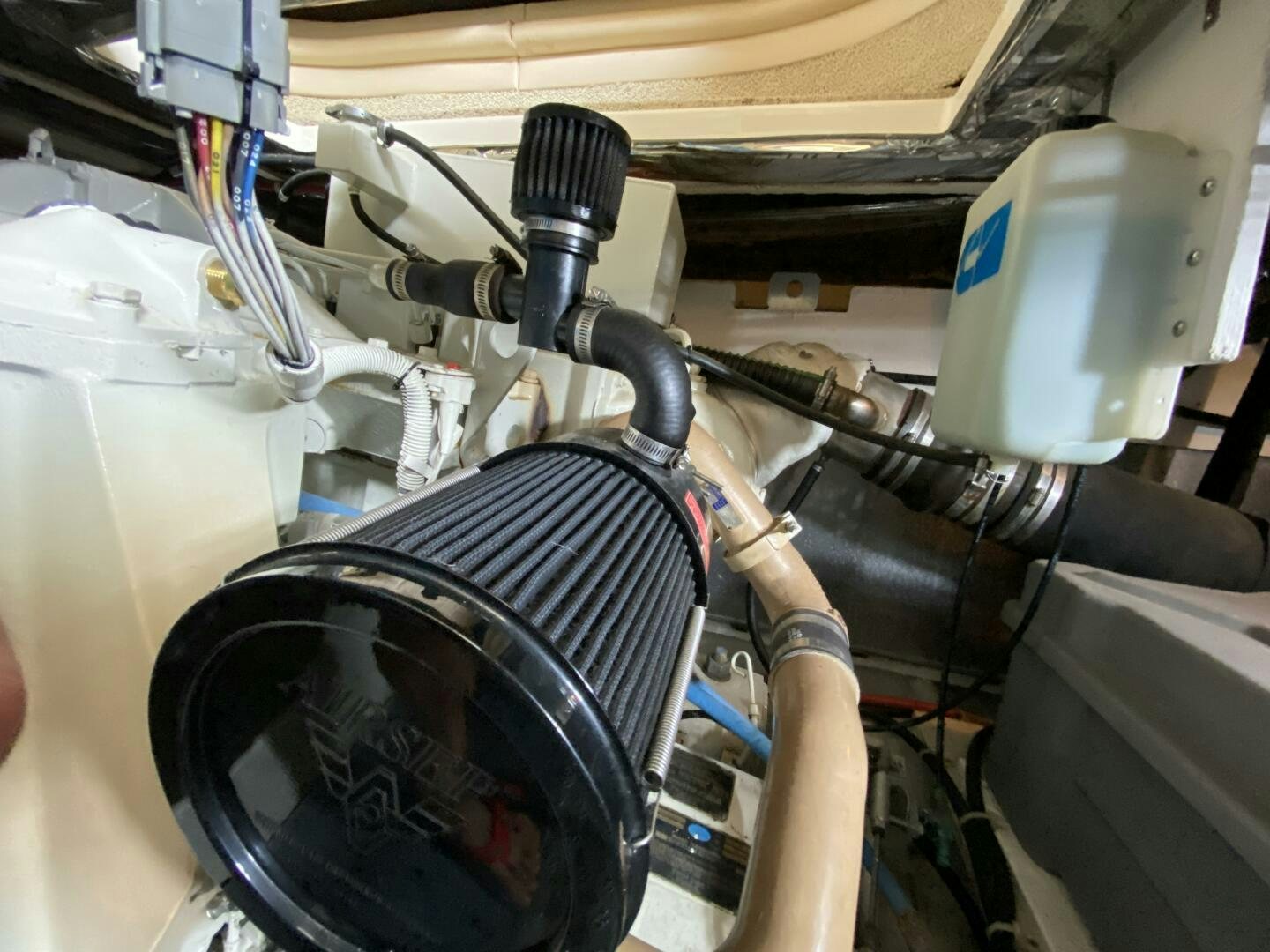 a close-up of a car engine aboard BIGG FIGG II Yacht for Sale