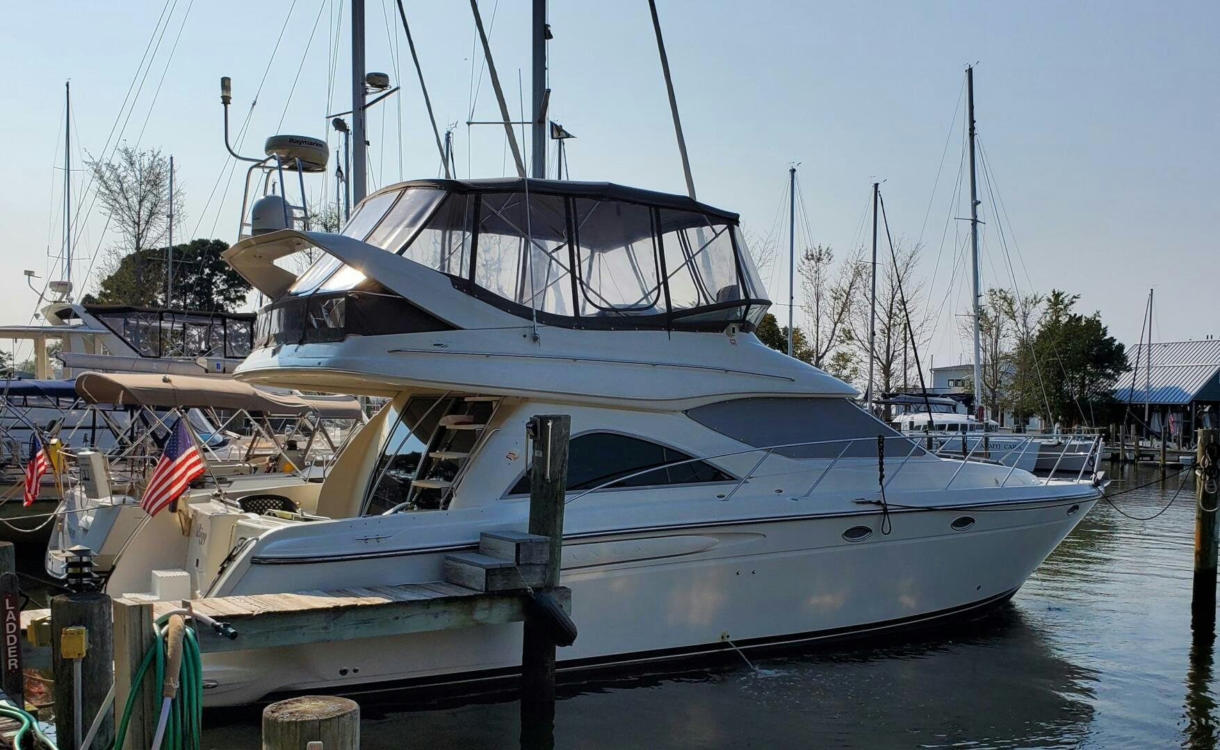 a boat docked at a pier aboard BIGG FIGG II Yacht for Sale