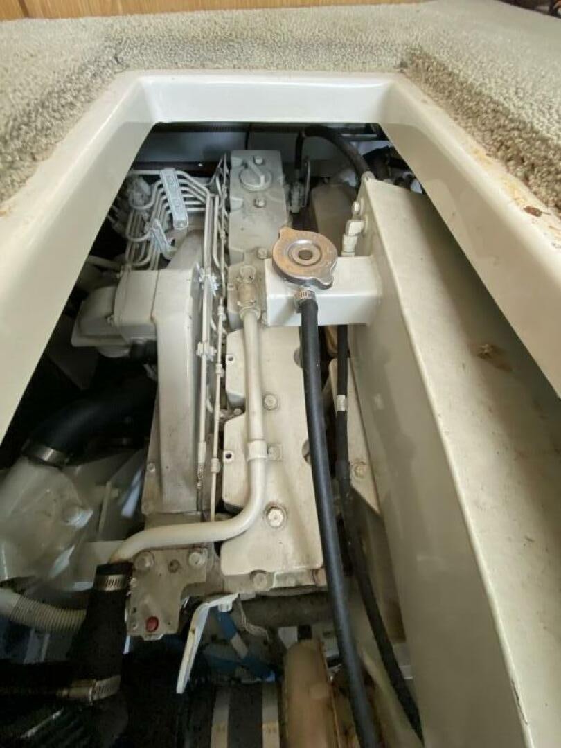a car engine with a metal frame aboard BIGG FIGG II Yacht for Sale