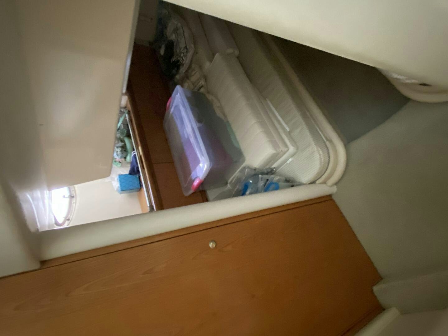 a toilet with a towel from the wall aboard BIGG FIGG II Yacht for Sale