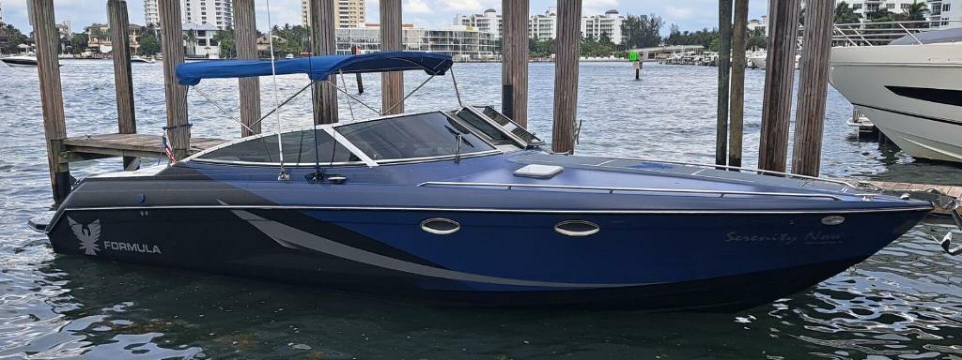 a boat parked on the water aboard SERENITY NOW Yacht for Sale