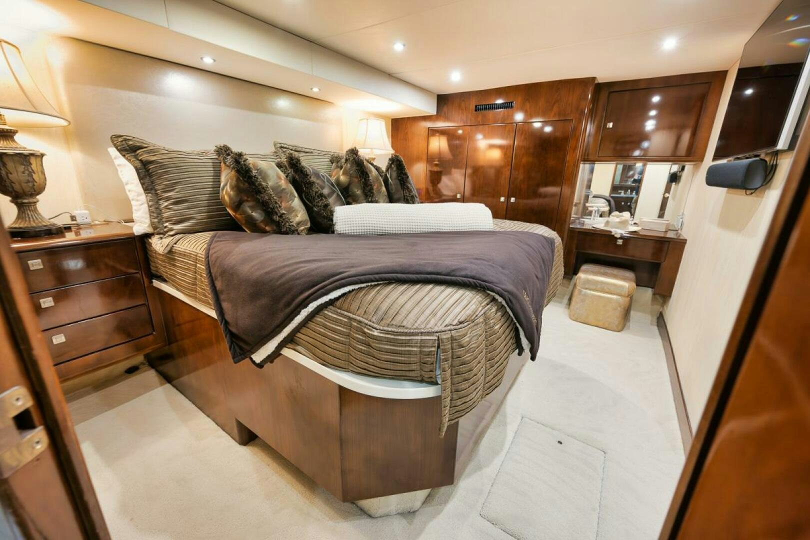 a bed in a room aboard UNCONQUERED Yacht for Sale