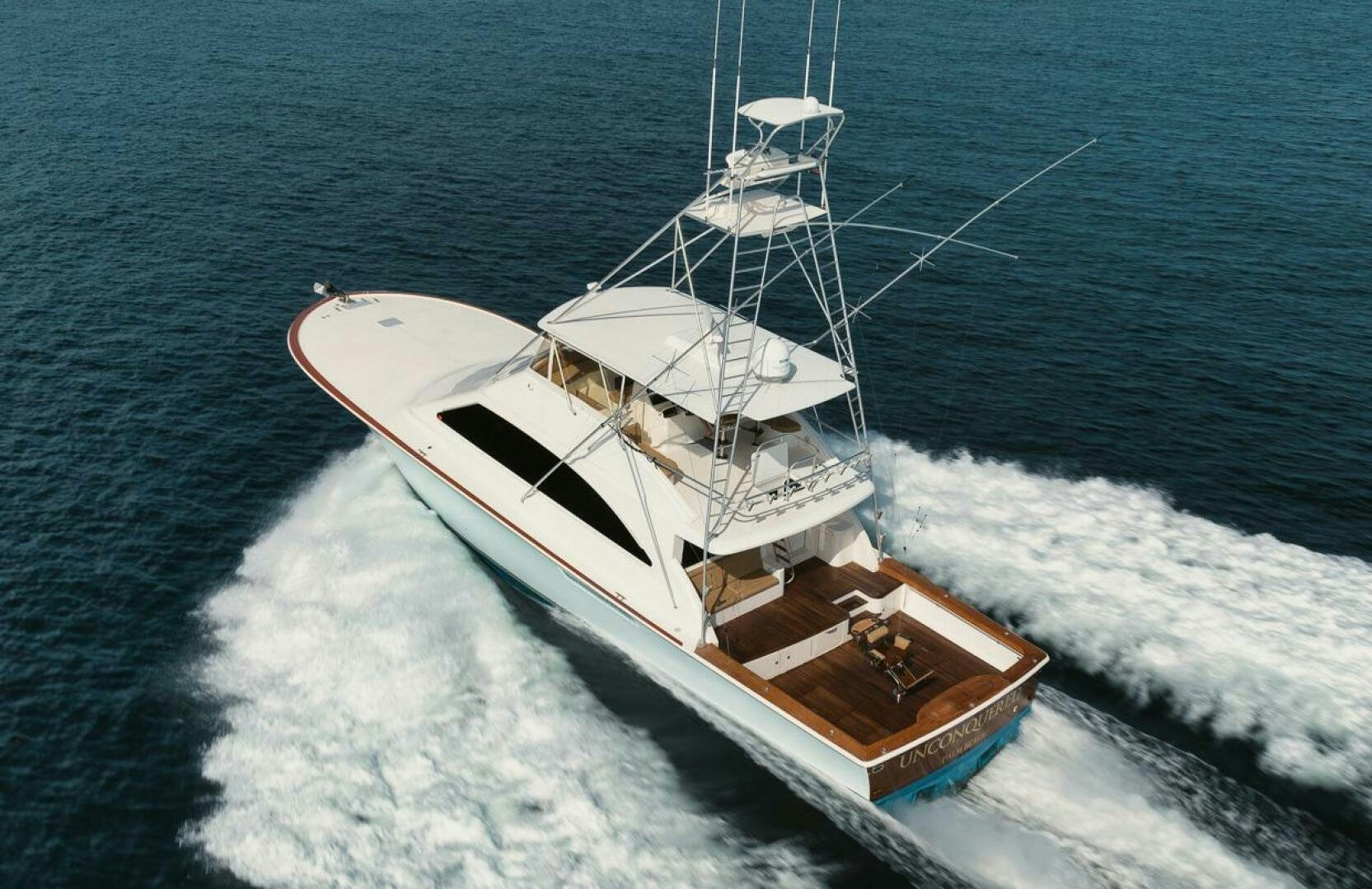 a boat on the water aboard UNCONQUERED Yacht for Sale