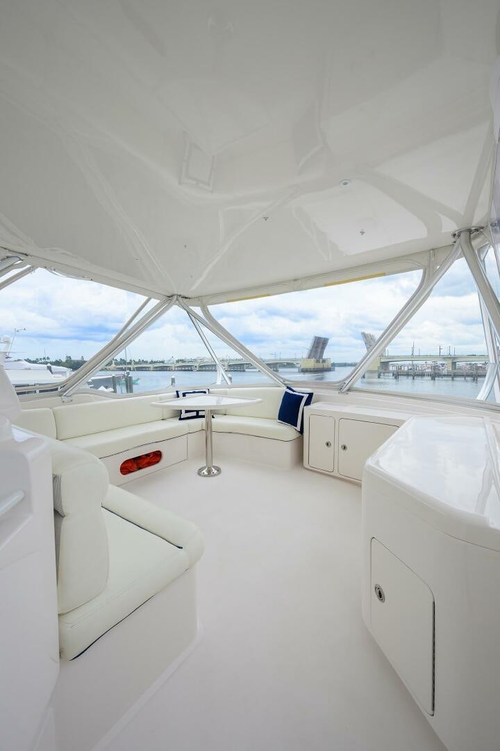 a room with a view of the water and a large window aboard GOIN DEEP Yacht for Sale