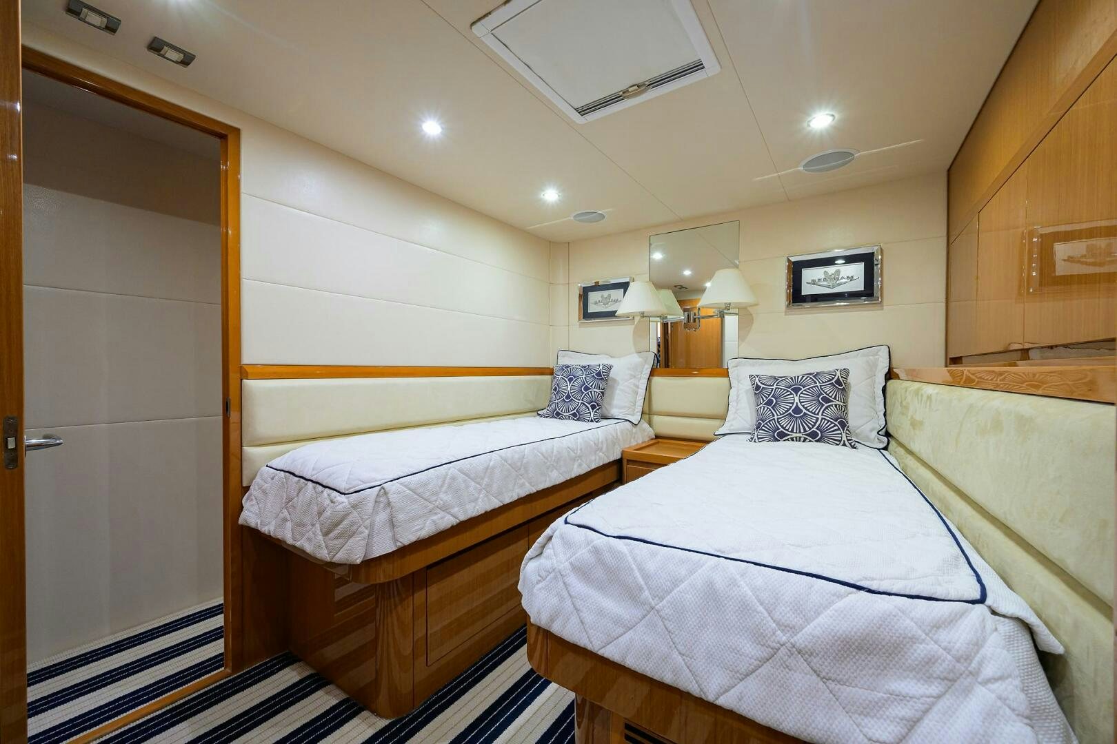 a couple of beds in a hotel room aboard GOIN DEEP Yacht for Sale