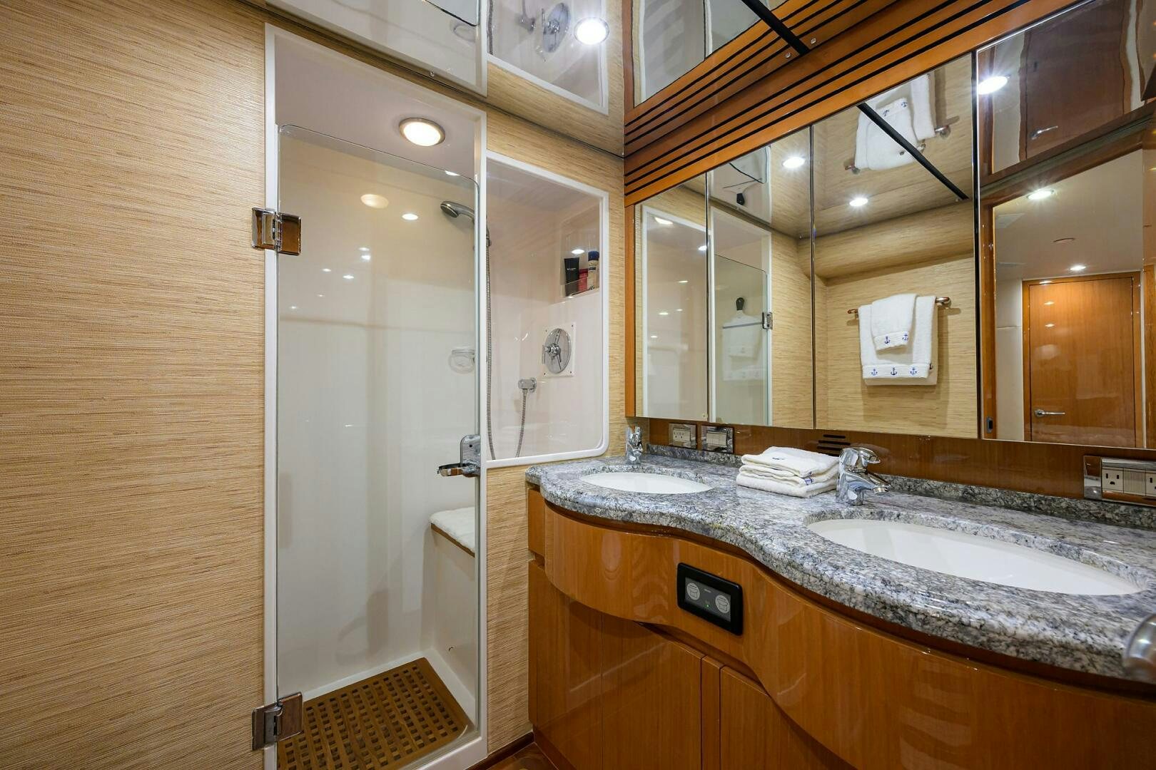 a bathroom with a sink and a shower aboard GOIN DEEP Yacht for Sale