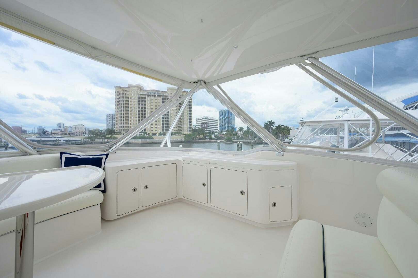 a room with a view of a city and a large window aboard GOIN DEEP Yacht for Sale