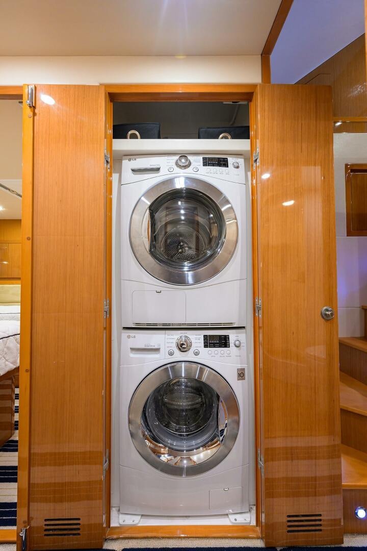 a couple of washers in a closet aboard GOIN DEEP Yacht for Sale