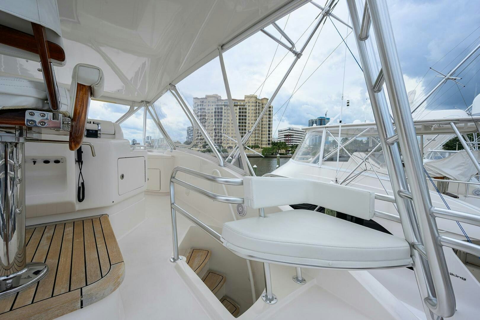 a large white tent with a deck aboard GOIN DEEP Yacht for Sale