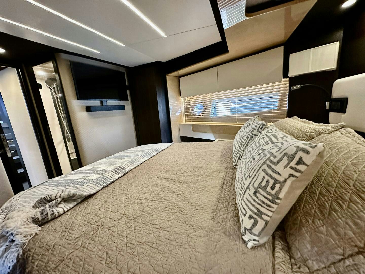 a bed with pillows aboard HOME WRECKER Yacht for Sale