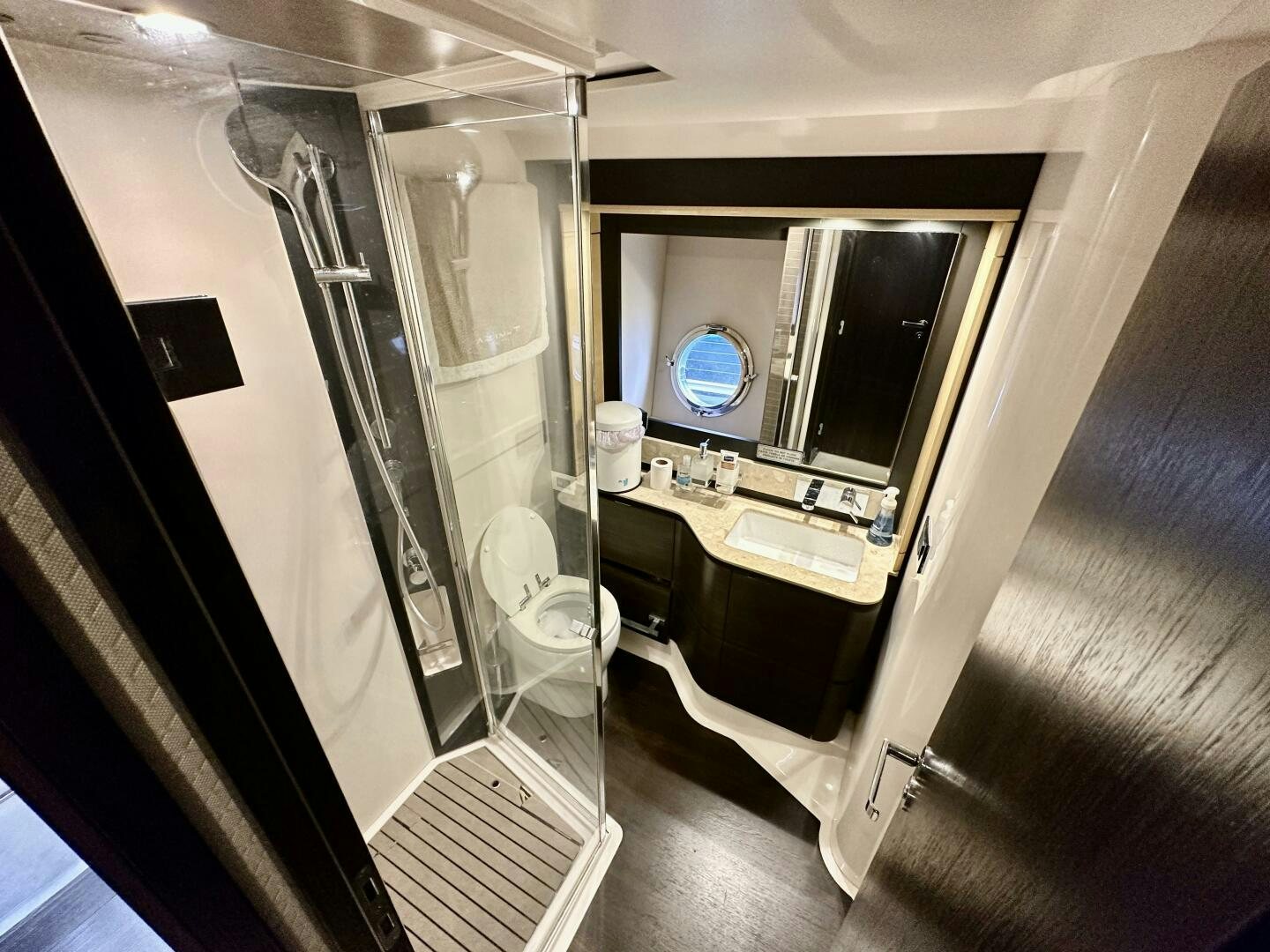 a bathroom with a large mirror aboard HOME WRECKER Yacht for Sale