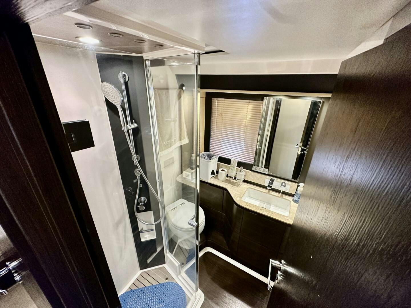 a bathroom with a sink and a mirror aboard HOME WRECKER Yacht for Sale