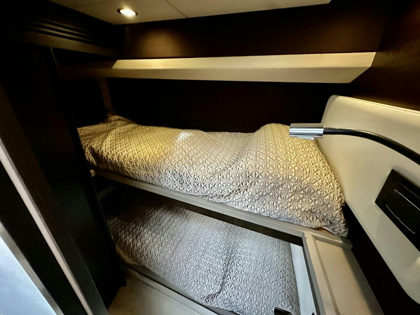 a bed with a white sheet aboard HOME WRECKER Yacht for Sale