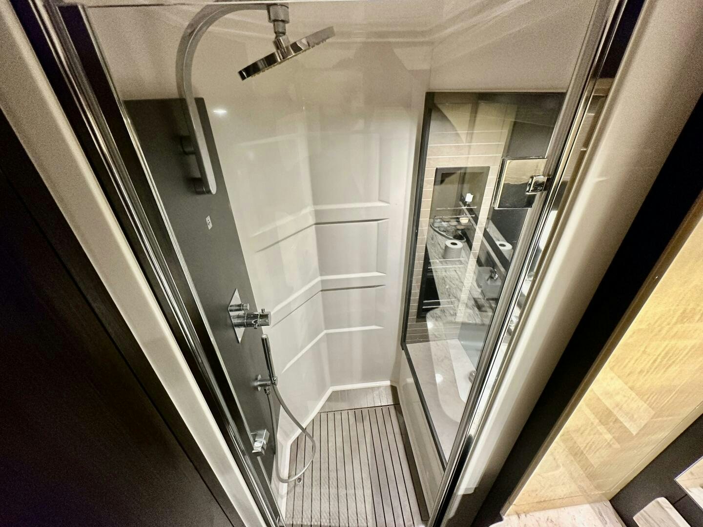 a bathroom with glass doors aboard HOME WRECKER Yacht for Sale