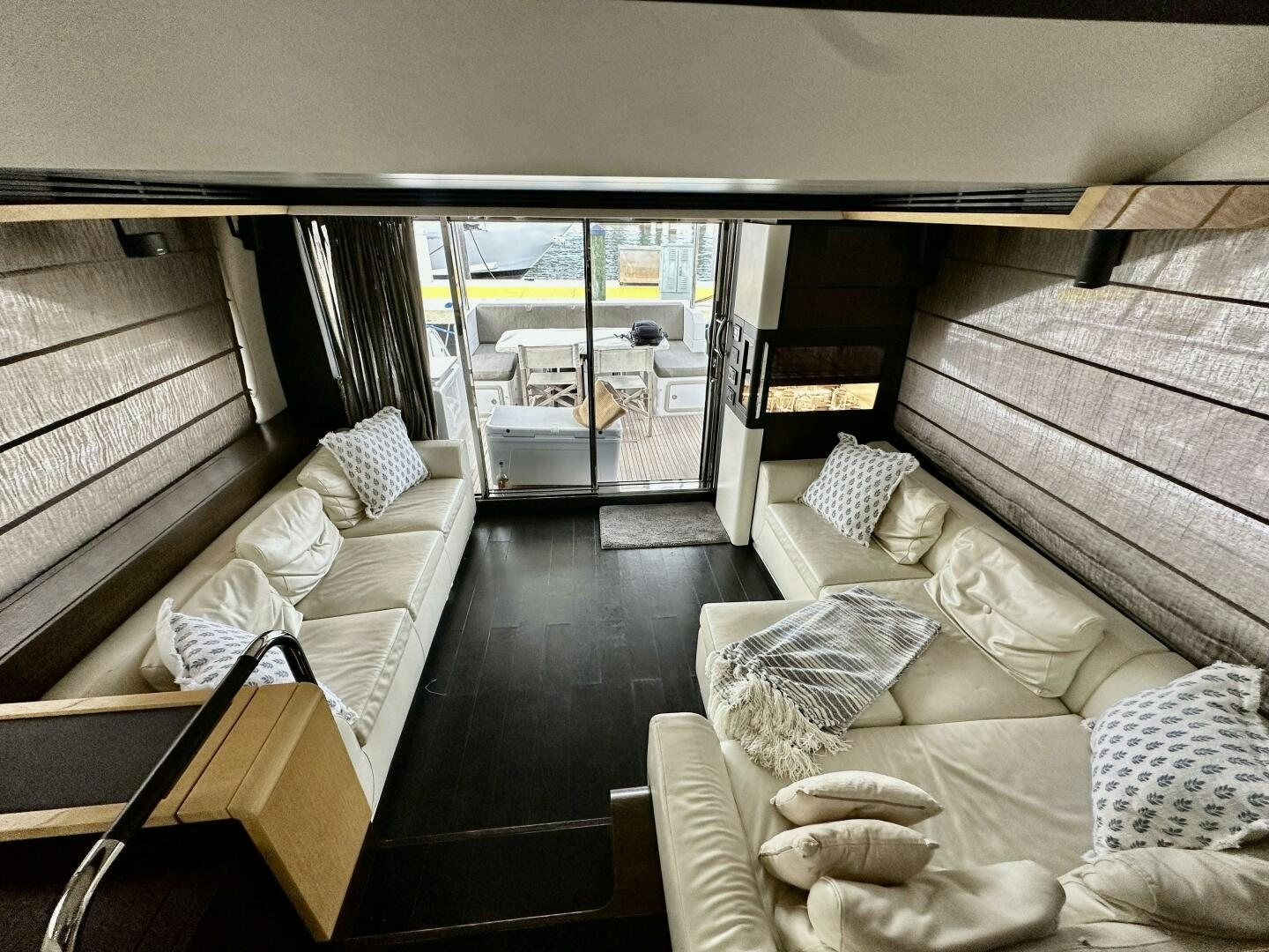 a bedroom with a bed and a table aboard HOME WRECKER Yacht for Sale