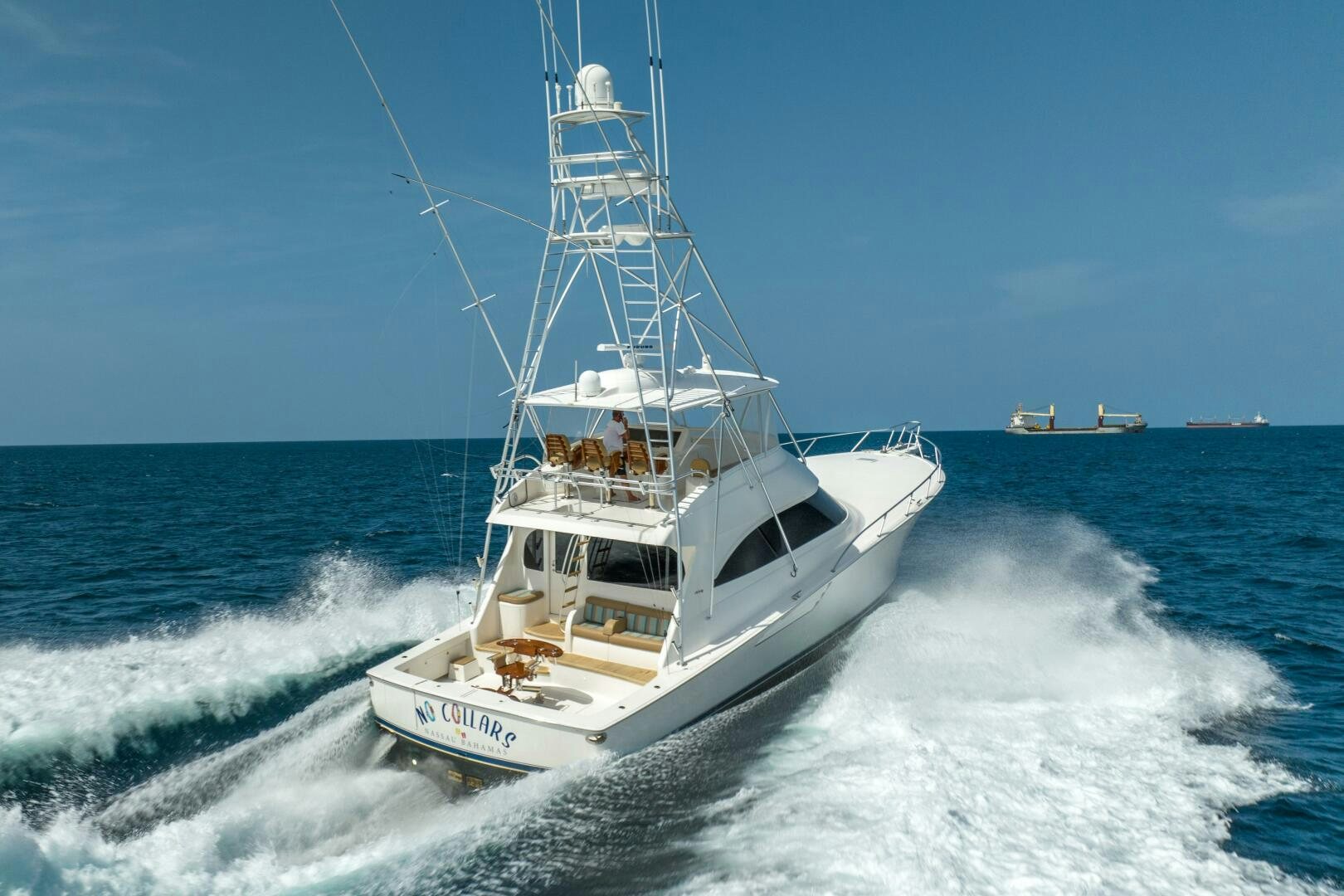 a boat on the water aboard NO COLLARS Yacht for Sale