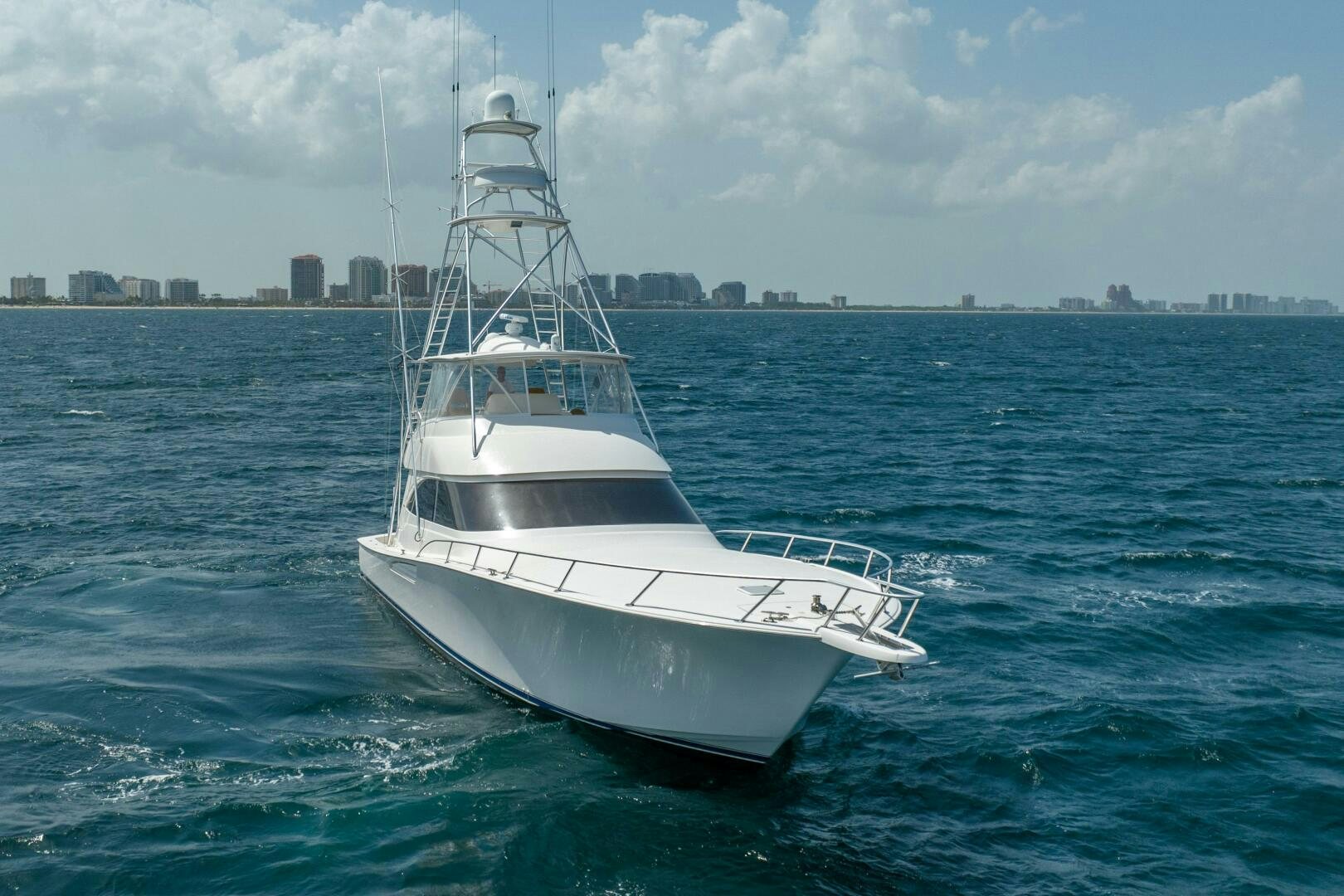 a white boat in the water aboard NO COLLARS Yacht for Sale