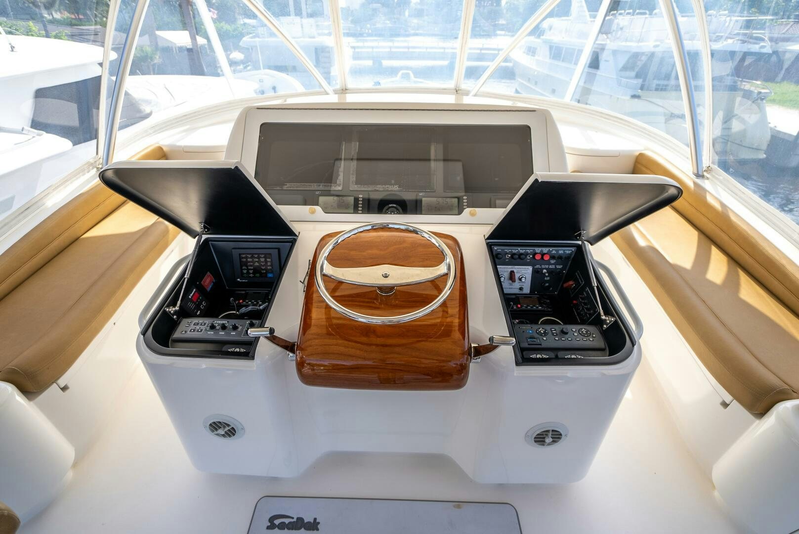 a car with a steering wheel aboard NO COLLARS Yacht for Sale
