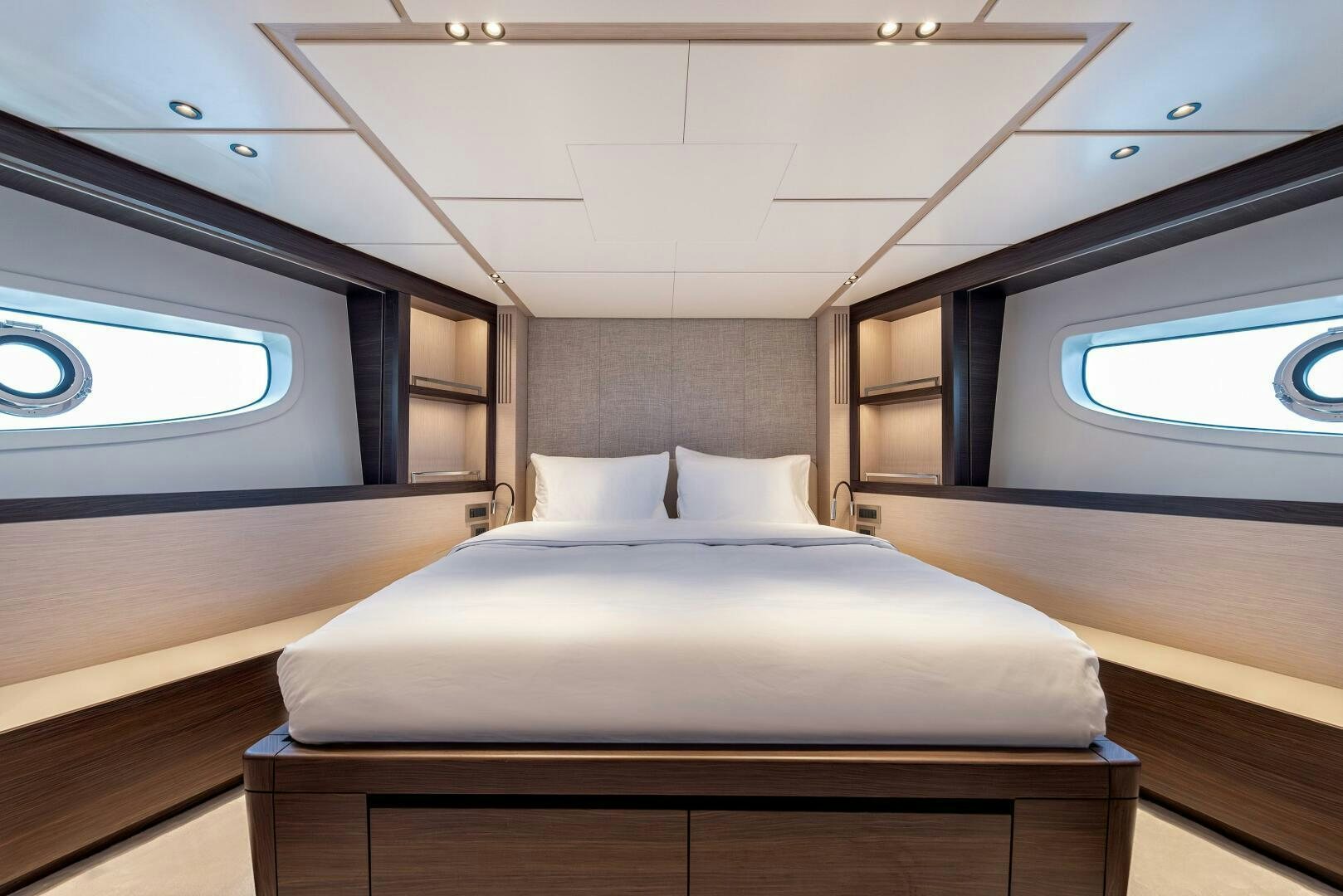 a bed in a room aboard SUNYA Yacht for Sale