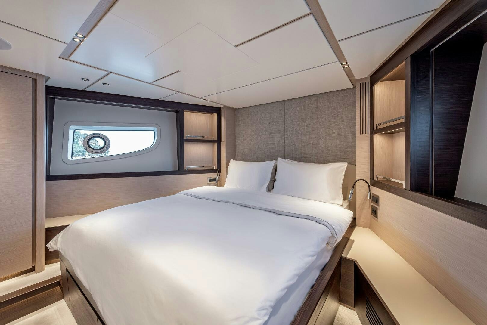 a bed in a room aboard SUNYA Yacht for Sale