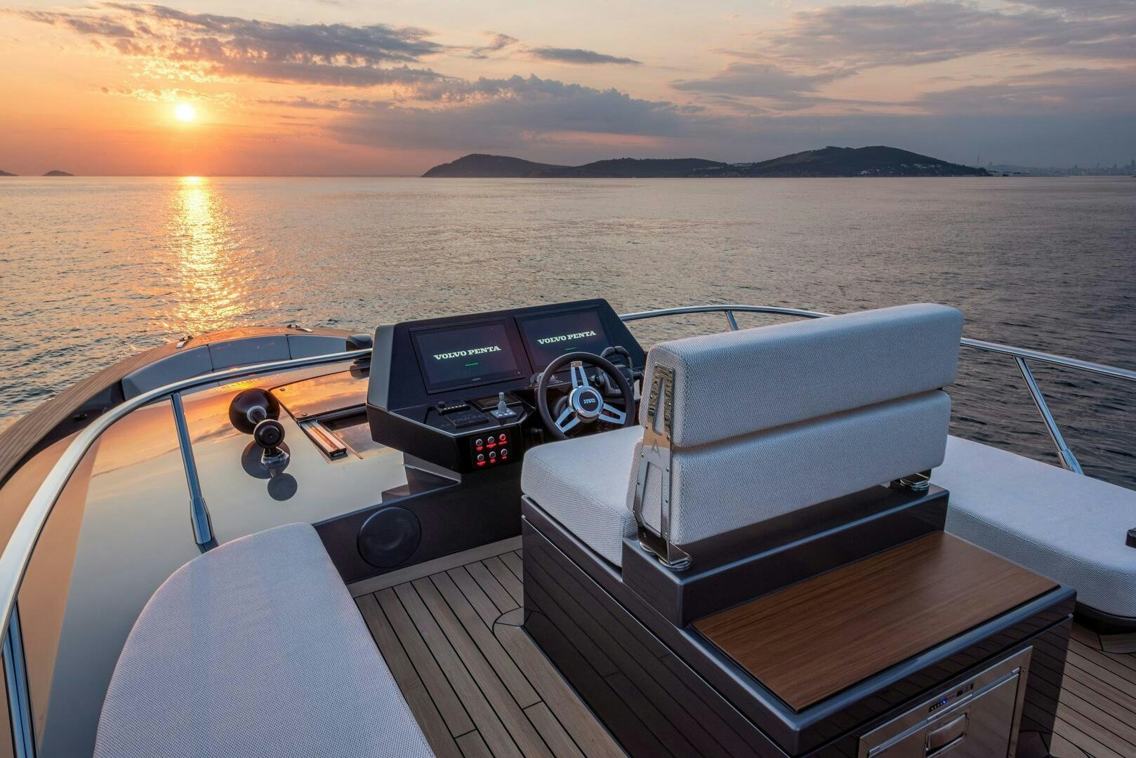 a boat with a view of the sunset and the ocean aboard SUNYA Yacht for Sale
