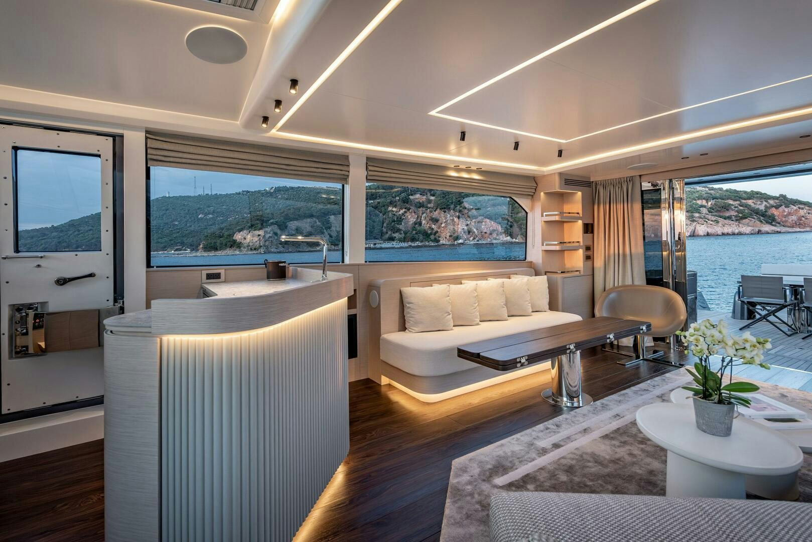 a living room with a large window aboard SUNYA Yacht for Sale