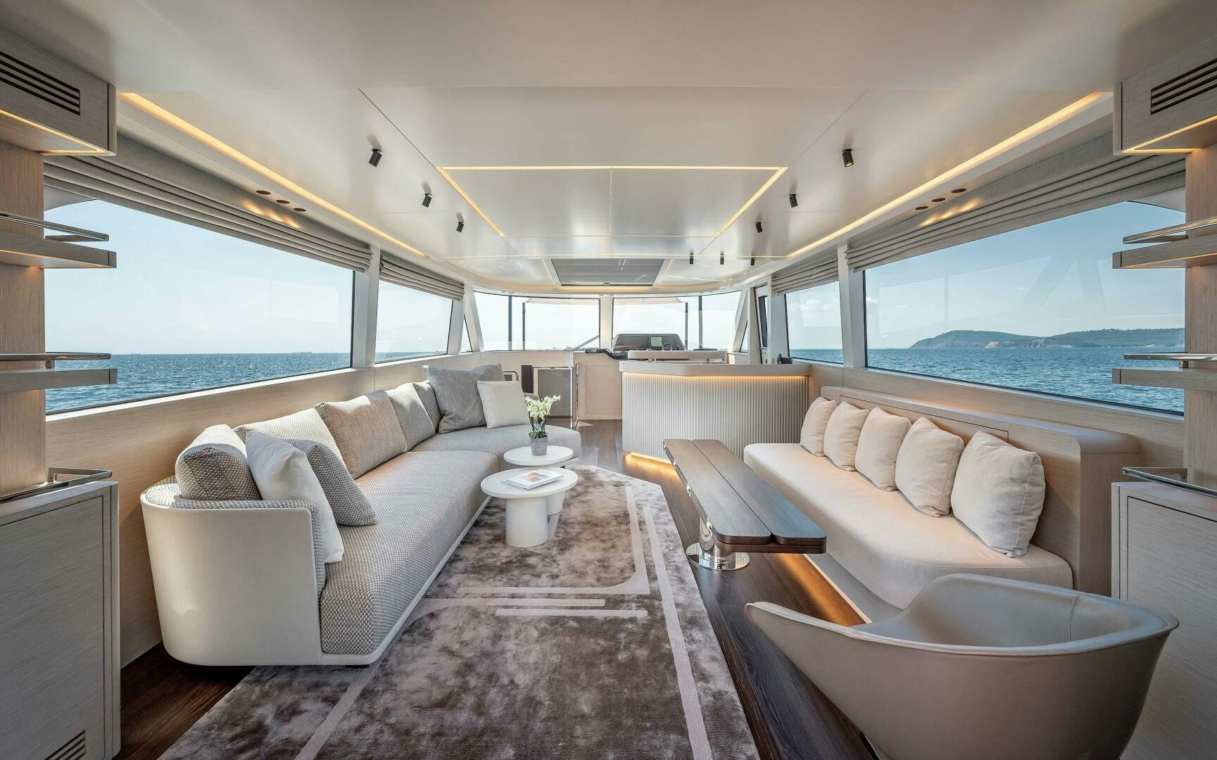 a living room with a large window aboard SUNYA Yacht for Sale