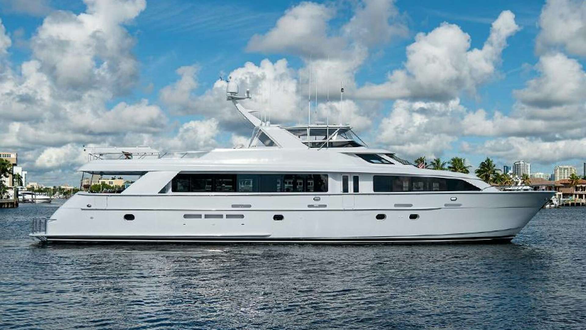 a white yacht on the water aboard MAGNUM RIDE Yacht for Sale