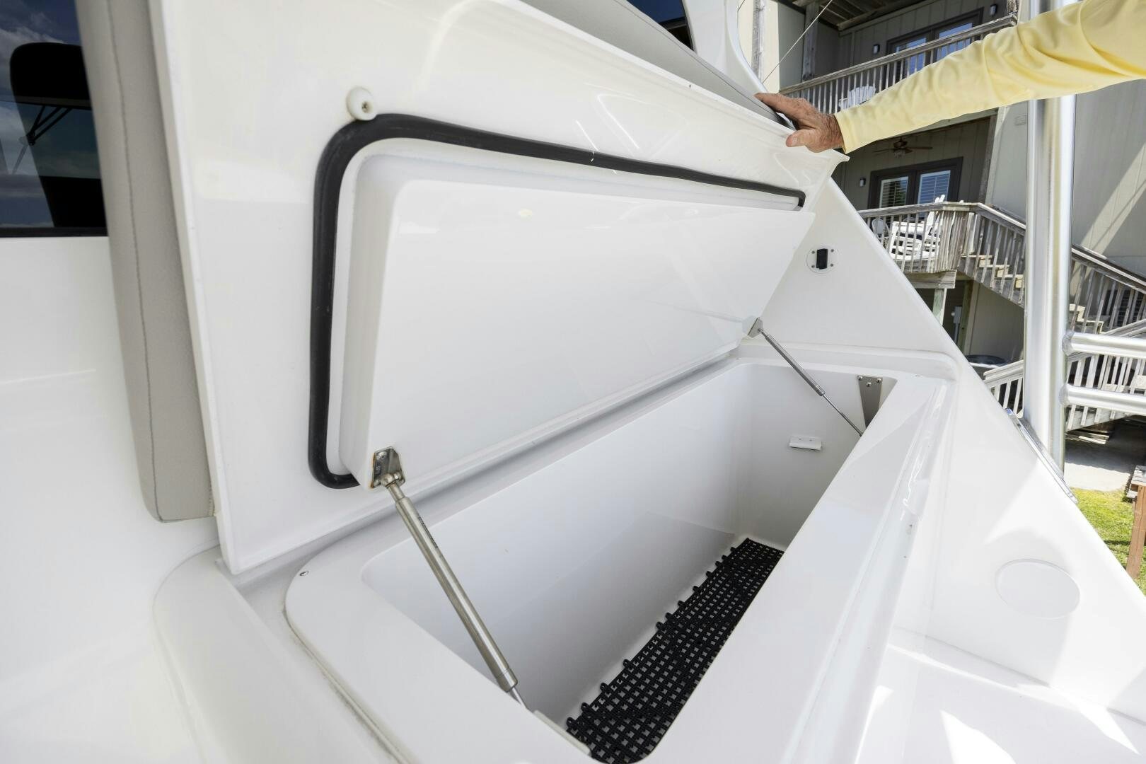 a white car with a black stripe aboard SAVING GRACE Yacht for Sale