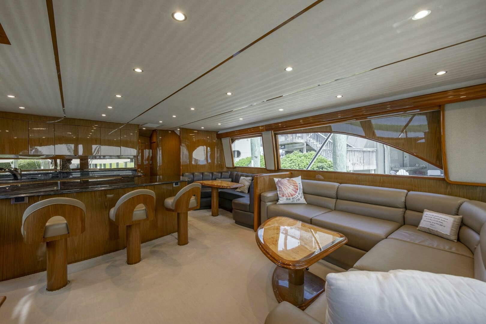 a large living room with a piano aboard SAVING GRACE Yacht for Sale