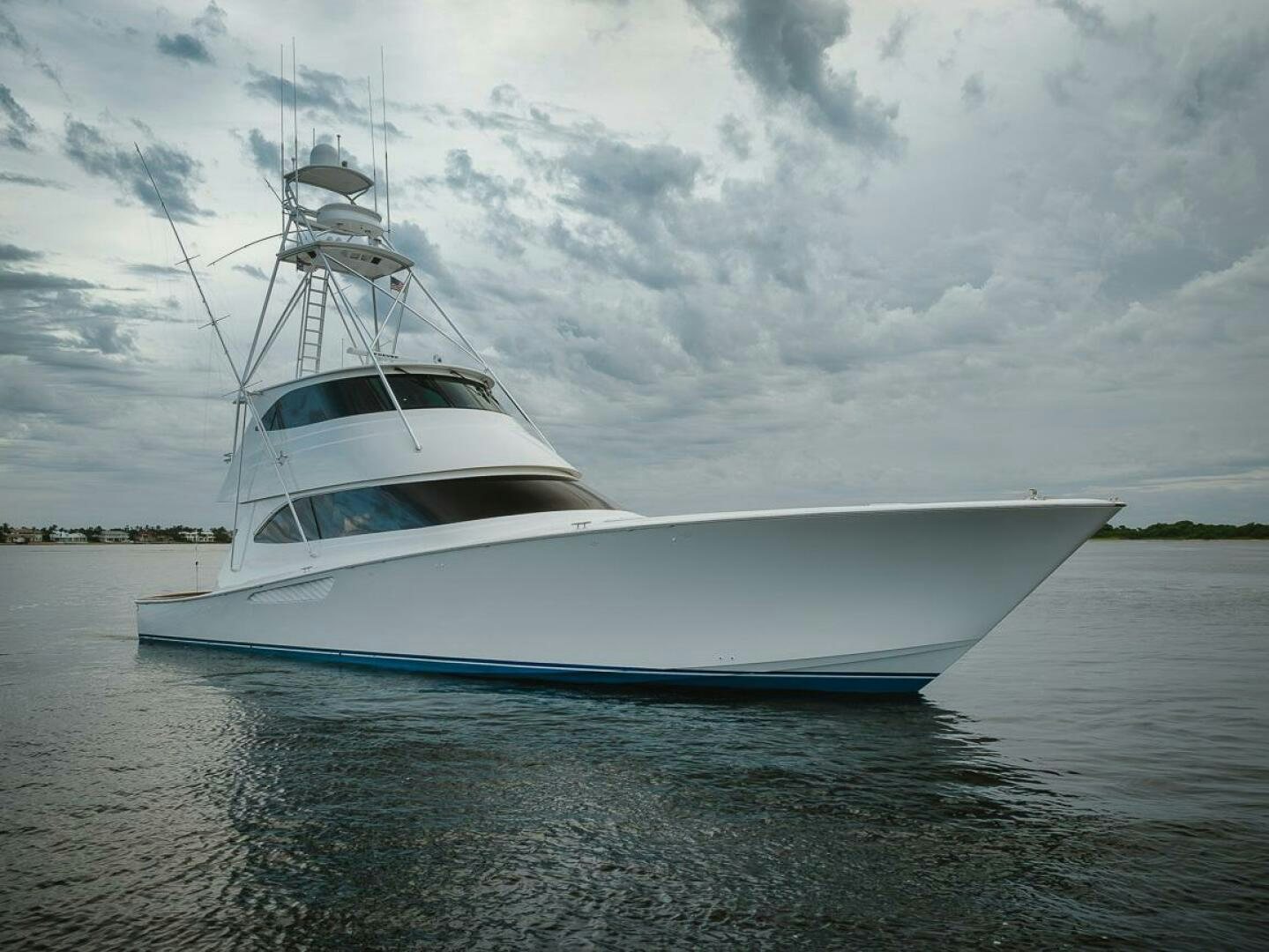 a white boat on the water aboard SAVING GRACE Yacht for Sale