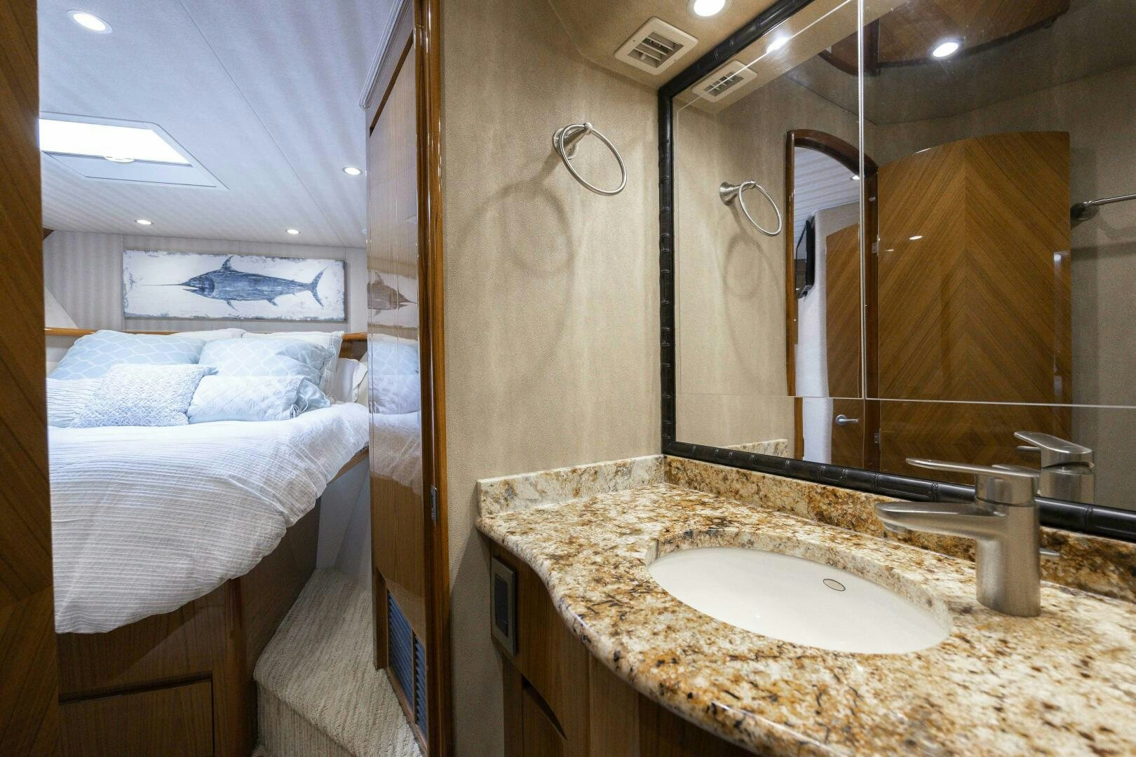 a bathroom with a sink and a mirror aboard SAVING GRACE Yacht for Sale