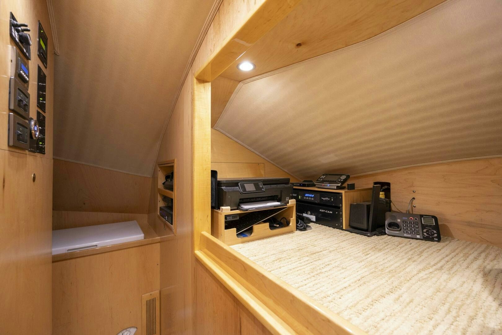 a room with a bed and a desk aboard SAVING GRACE Yacht for Sale