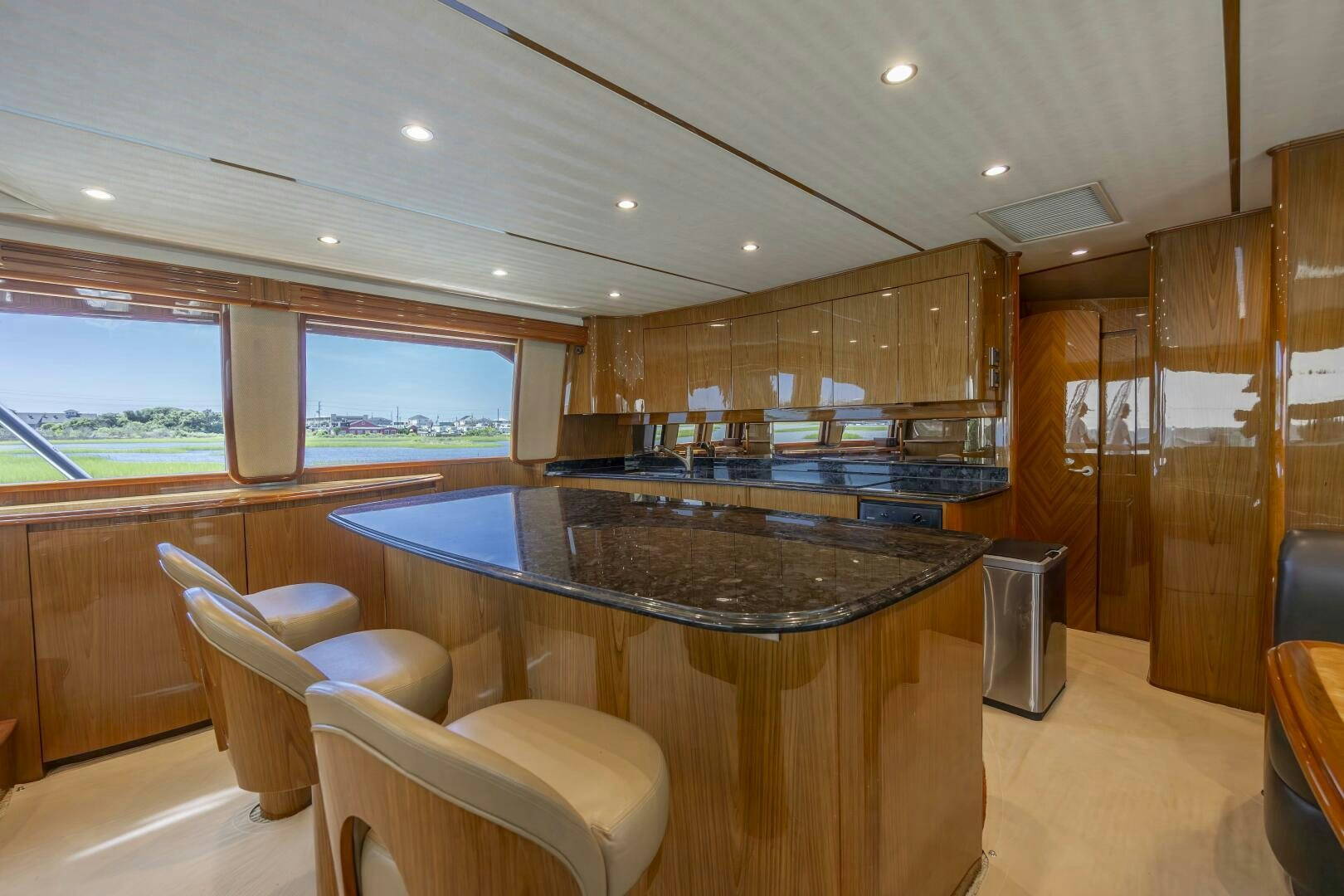a large kitchen with a large bar aboard SAVING GRACE Yacht for Sale