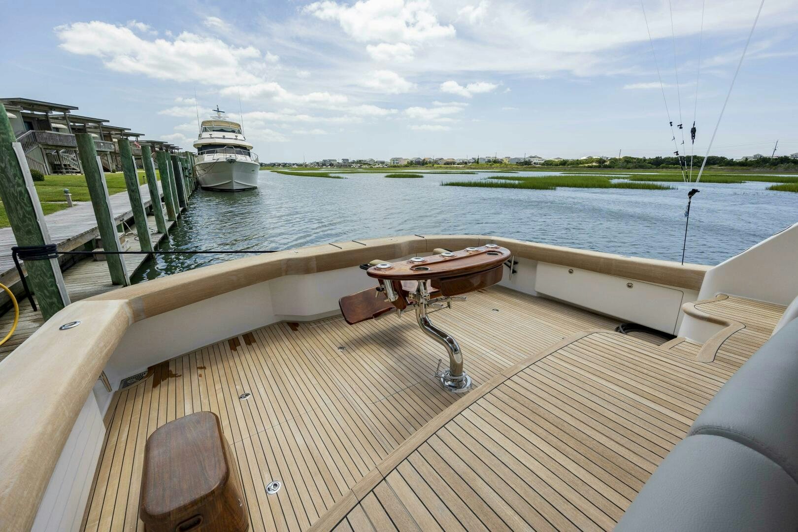 a deck with a boat in the water aboard SAVING GRACE Yacht for Sale