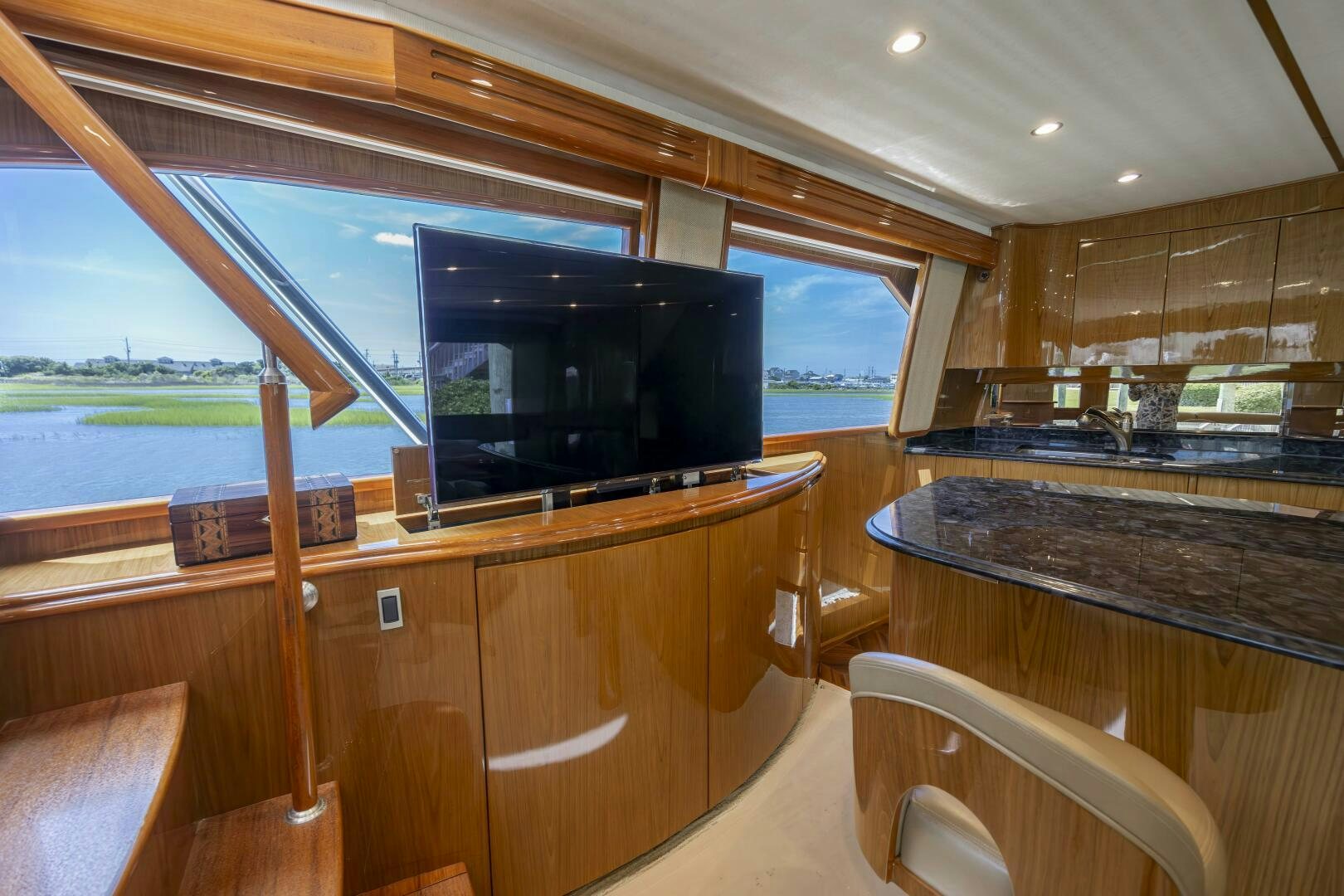 a kitchen with a large window aboard SAVING GRACE Yacht for Sale