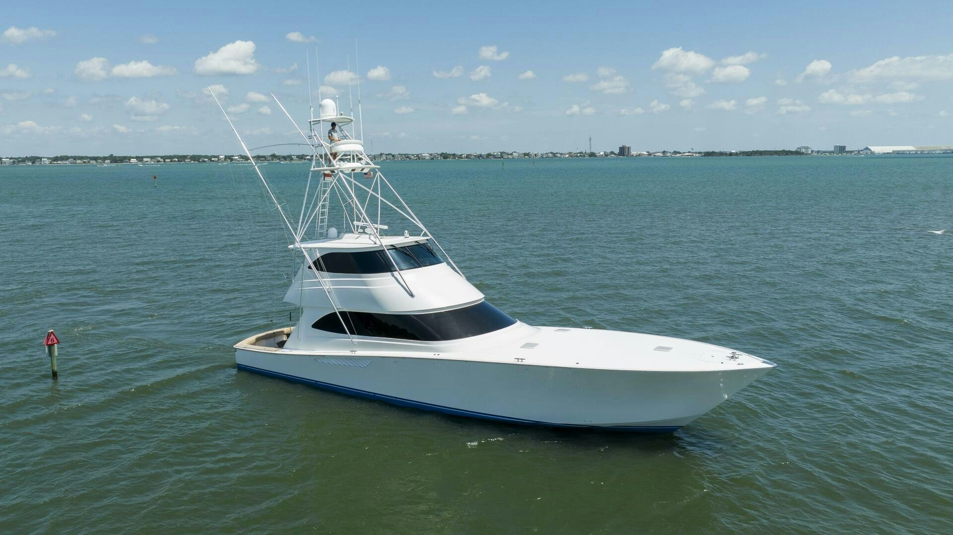 a white boat in the water aboard SAVING GRACE Yacht for Sale