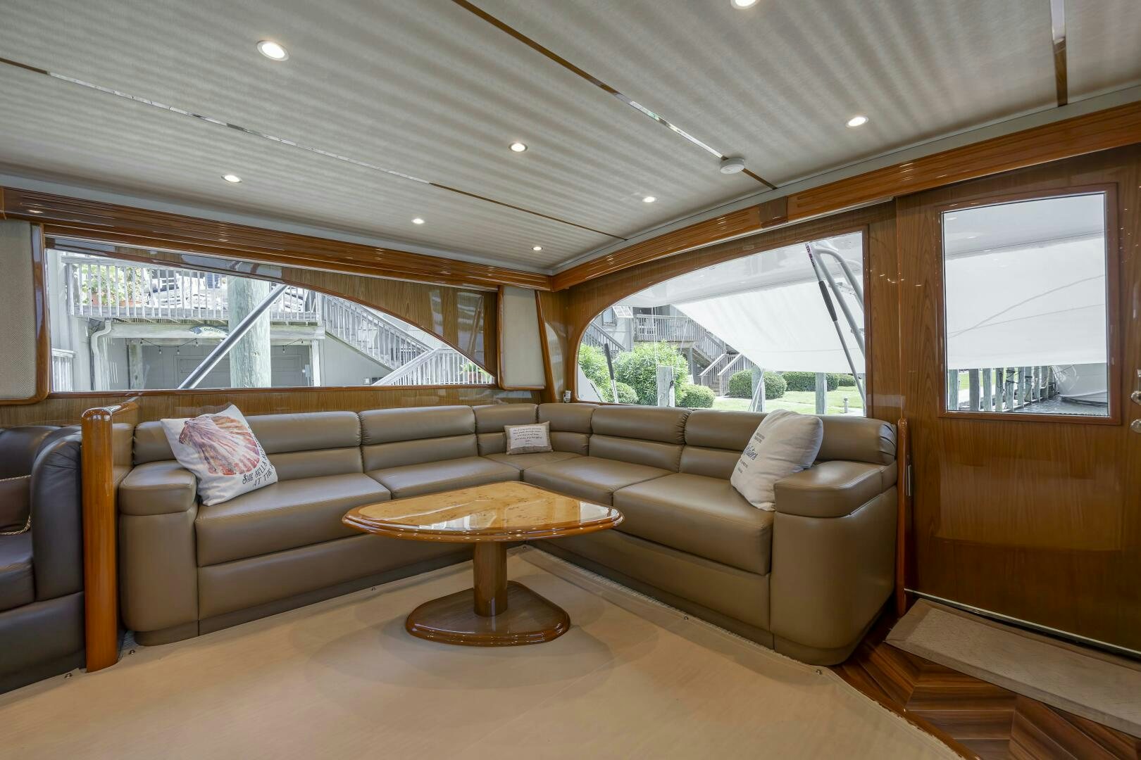 a living room with a couch and a table aboard SAVING GRACE Yacht for Sale