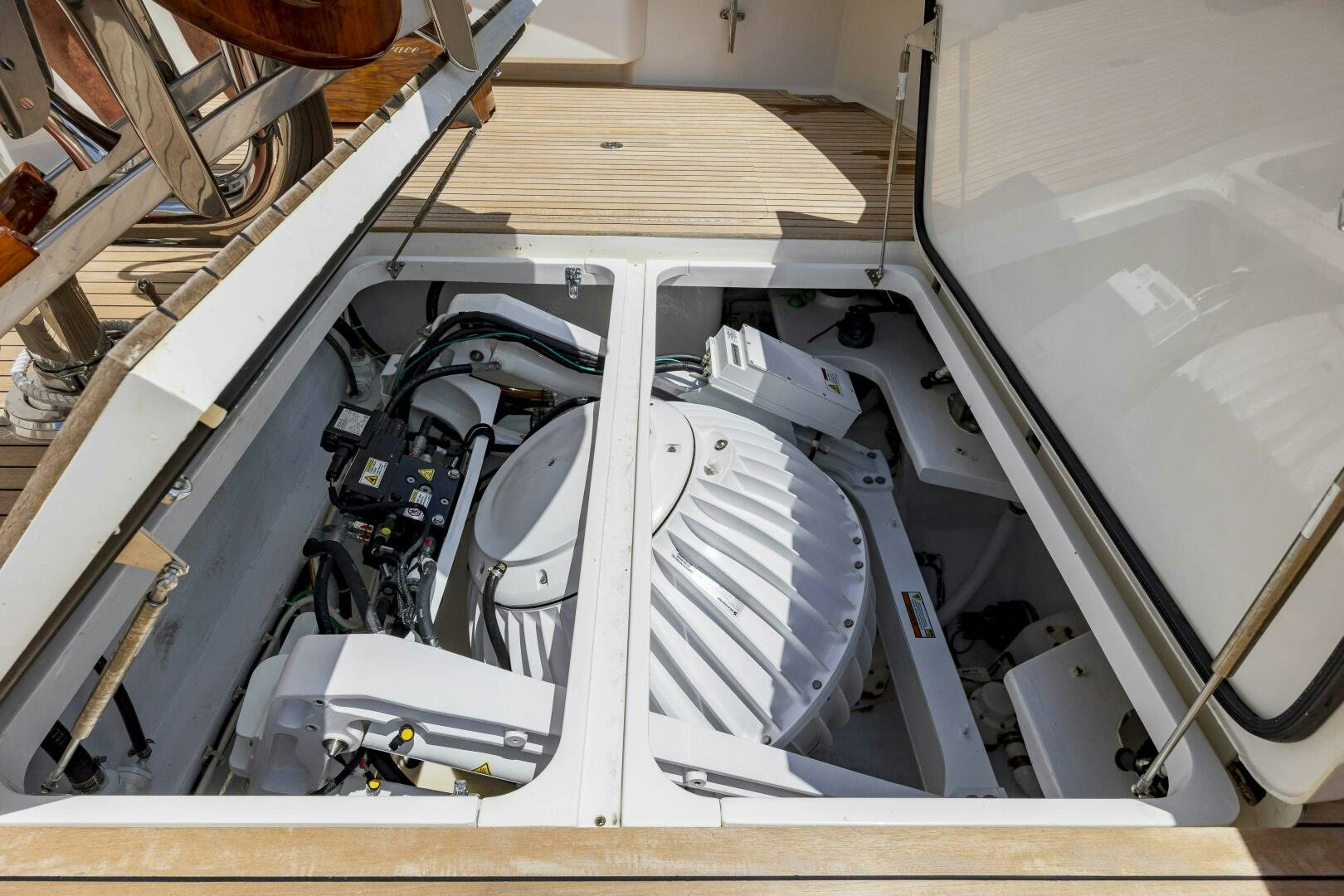 a car with its hood open aboard SAVING GRACE Yacht for Sale