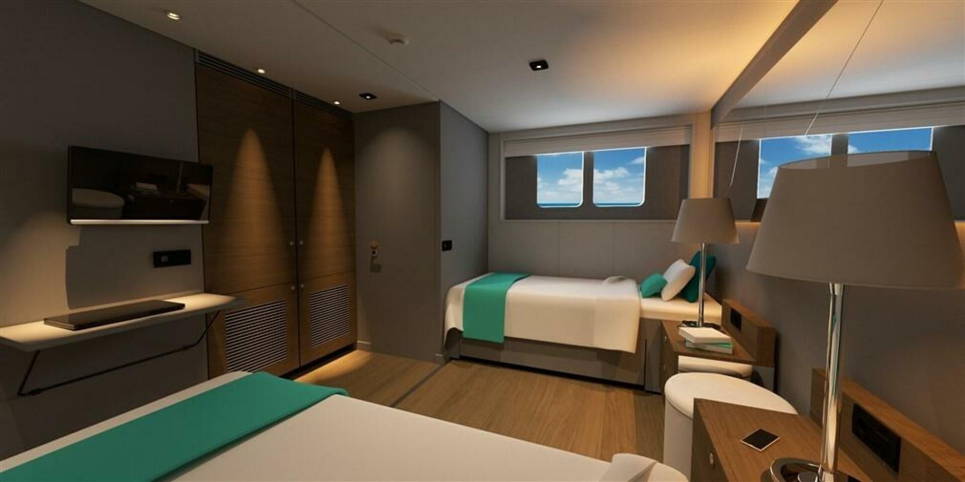 a room with a bed and a lamp aboard PROJECT NIRVANA Yacht for Sale