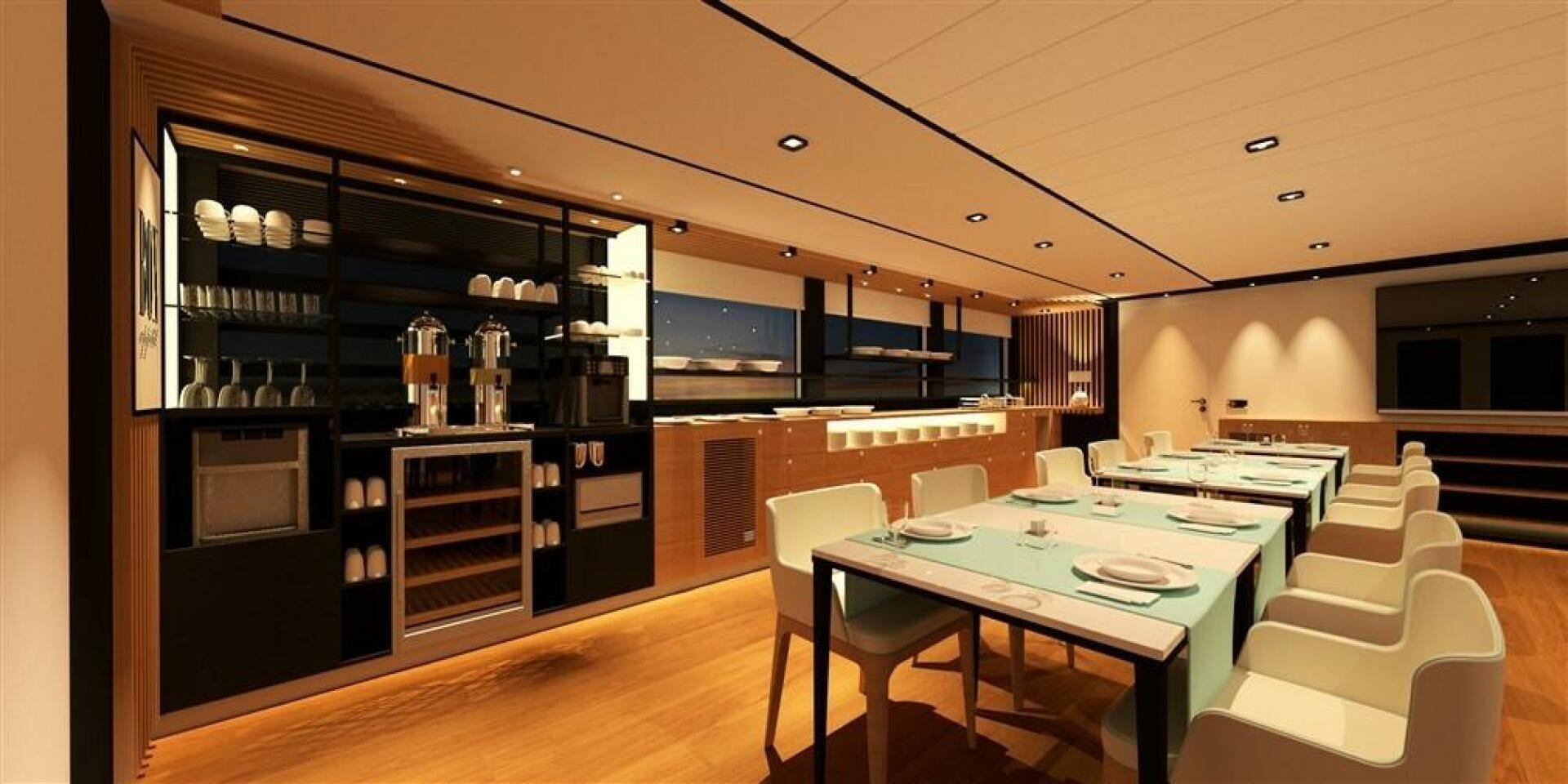 a room with a table and chairs aboard PROJECT NIRVANA Yacht for Sale