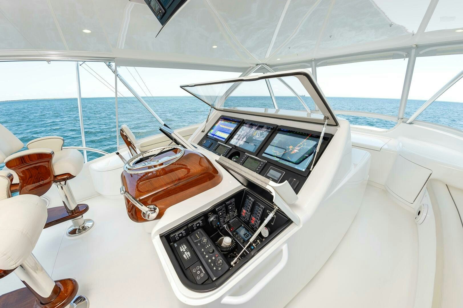 a boat with a computer on it aboard KNOT DONE YET Yacht for Sale