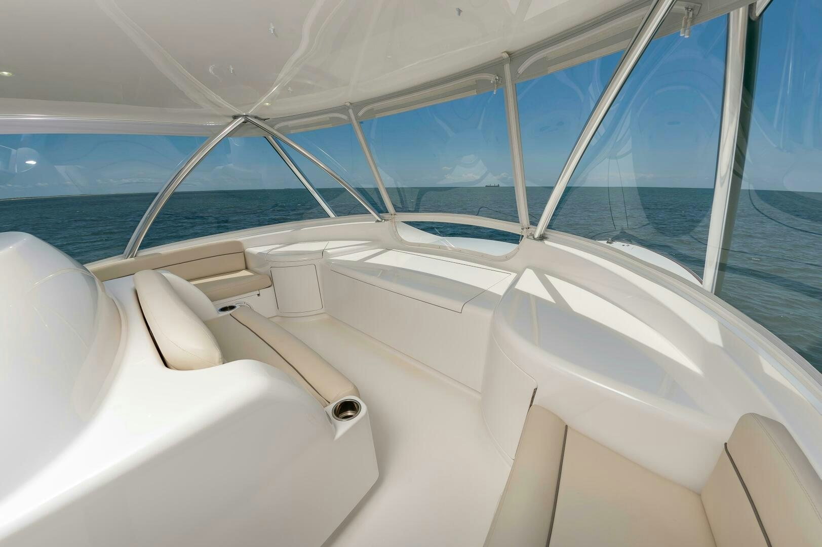 a white boat with a large window aboard KNOT DONE YET Yacht for Sale