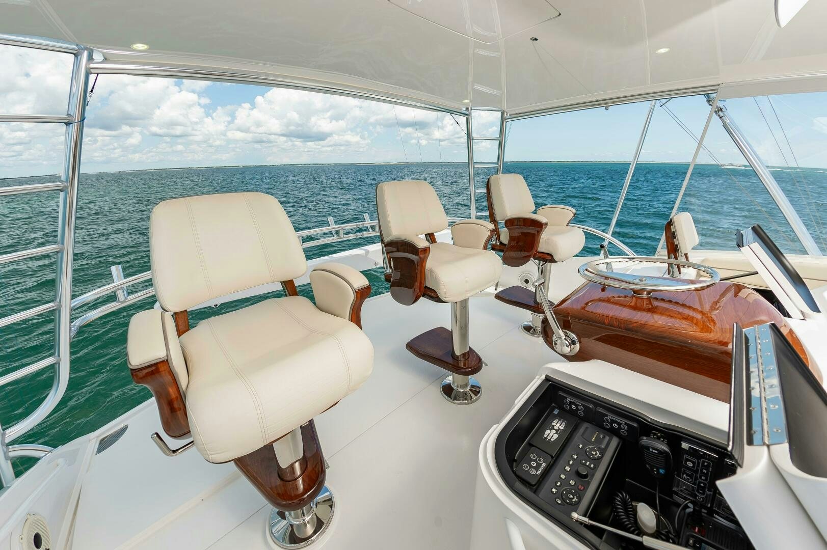 a boat with chairs and a table aboard KNOT DONE YET Yacht for Sale
