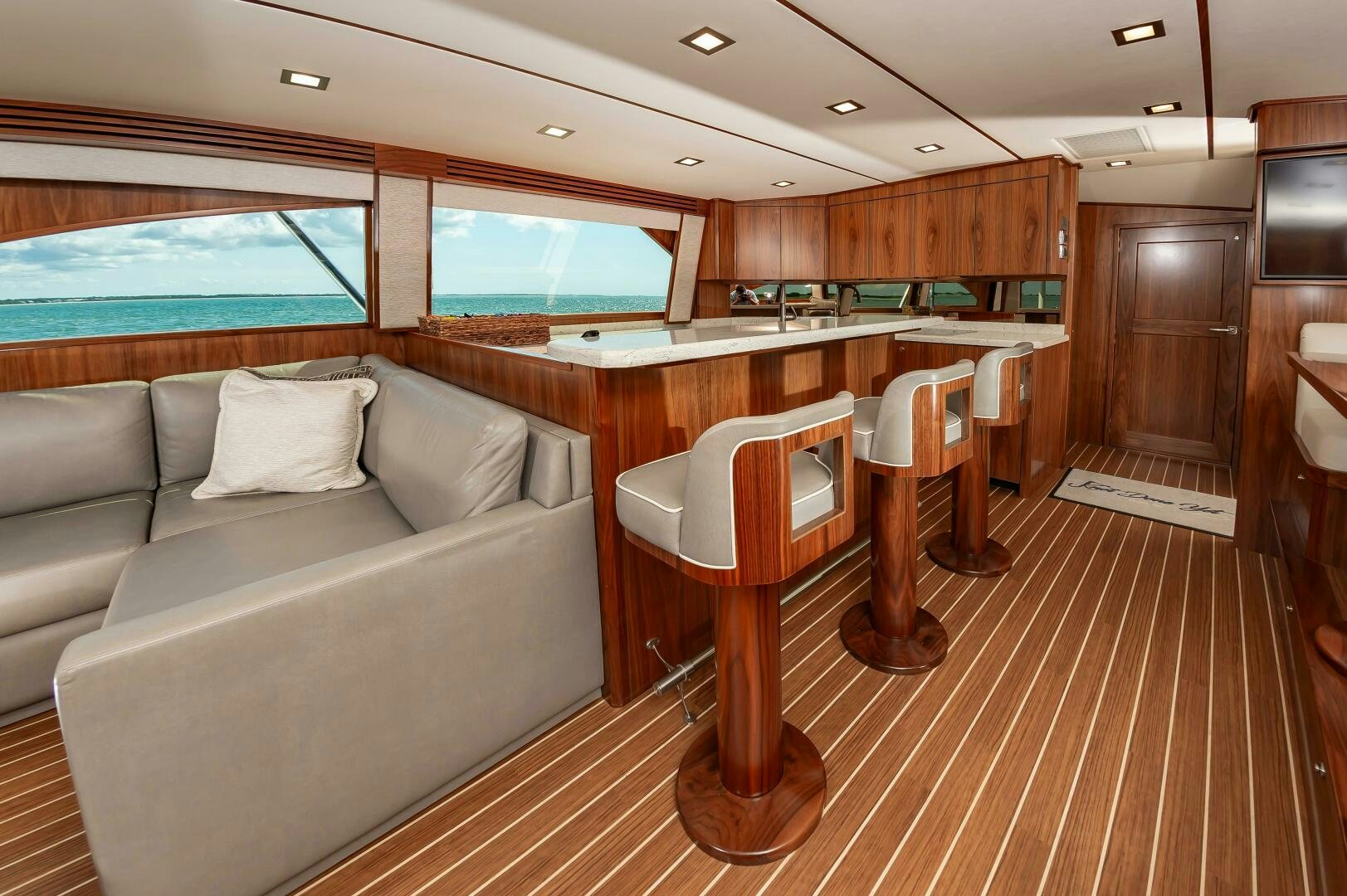 a room with a couch and a table aboard KNOT DONE YET Yacht for Sale